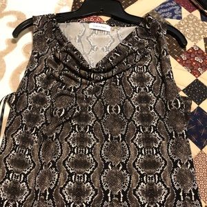 Snake print shell in perfect condition.